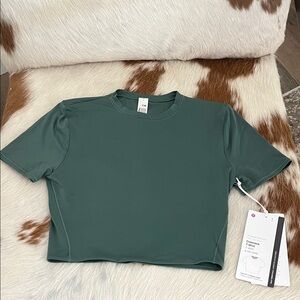 Super soft crewneck t shirt size small/petite.  Lululemon .soft green.